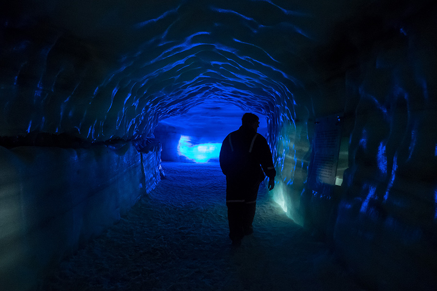 Walking into the glacier with crampons, special equipment that fits over the shoes.